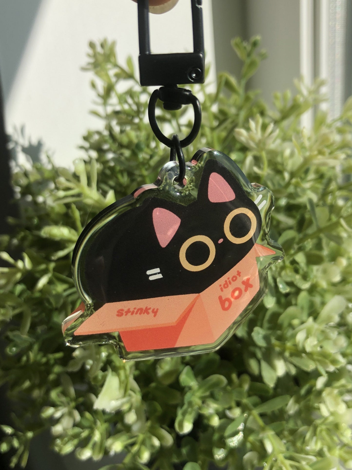 idiot box cat acrylic charm